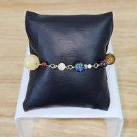 
              Solar System bead bracelet
            