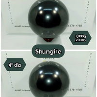 Shungite #01: : A stunning shungite sphere that had tremendous size. This large sphere weighs in at a mind blowing 1,300 grams (3.9 lbs.)!!! It extends out 4.00" showing you it's amazing presence and beauty. This is a great metaphysical healing tool. It's perfect for decoration and collecting as well.